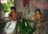 (c) Copyright - Raphael Kessler 2011 - Indonesia - Siberut - Wrapping the sago in leaves for cooking