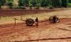 (c) Copyright - Raphael Kessler 2011 - Myanmar - Impersonating a Constable - Tilling the fields