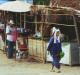 (c) Copyright - Raphael Kessler 2011 - Thailand - Akha tribal woman in full regalia in the market