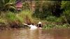 (c) Copyright - Raphael Kessler 2011 - Vietnam - Mekong Delta doing the laundry in the river