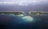 (c) Copyright - Raphael Kessler 2011 - French Polynesia - Rangiroa - Passage through the atoll from the air