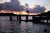 (c) Copyright - Raphael Kessler 2011 - Tonga - Vava'u - Boys diving from the pier at sunset