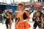 (c) Copyright - Raphael Kessler 2011 - Bolivia - Oruro Carnaval - Orange girl