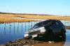 (c) Copyright - Raphael Kessler 2011 - Chile - Torres del Paine - Car stuck in the mud