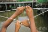 (c) Copyright - Raphael Kessler 2011 - Venezuela - Orinoco Delta - Warao tribes people - Child electricians